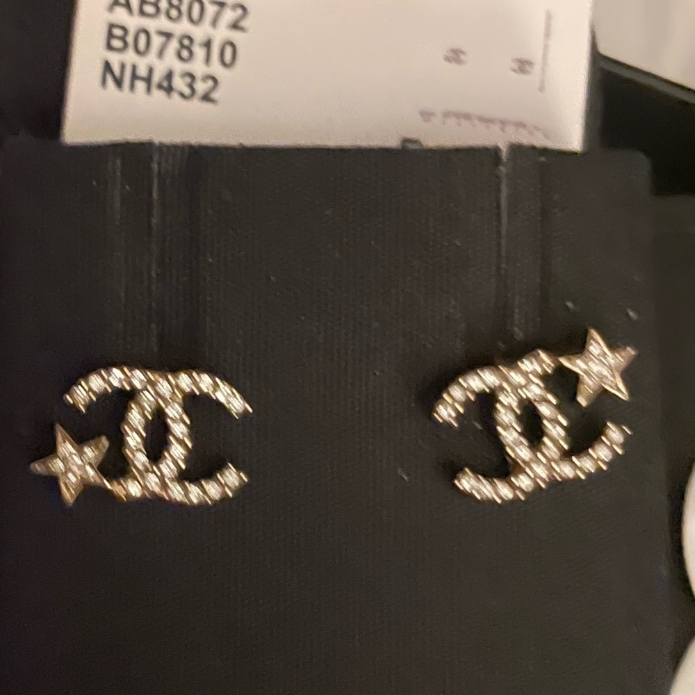 Brand new Chanel earrings authentic full set with tag box and Camilla